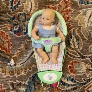 2010 Bitty Baby with dress and doll bouncer